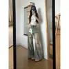 Jeans anchos de estilo retro americano desgastado para mujer, nuevo modelo de verano 2026, pantalones acampanados holgados y estilizados