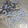 Taladro para uñas azul claro plano al por mayor red net mariposa estrella amor vidrio diy decoración de uñas pedrería