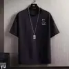 Verano 2026 Nuevo Estilo Camiseta de Manga Corta Holgada Talla Grande para Jóvenes Estilo Japonés de Media Manga Marca de Moda Ropa para Hombre