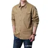 Camisa de trabajo de algodón puro para hombre, estilo primavera y otoño, cuello camisero, corte holgado casual, camisa de color liso, diseño multibolsillos para hombre