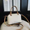 Bolso de mano retro transfronterizo para mujer, nuevo bolso de hombro simple de moda 2026, bolso cruzado versátil de nicho para el día a día