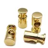 Metal dorado puntual agujero único cuerda de ajuste elástico hebilla Hebilla de resorte de presión hebilla de cabeza de cuerda hardware de galvanoplastia para ropa grano colgante