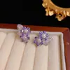 Aretes Franceses de Zirconio Microincrustado Doble Pétalo para Mujer, Lujo Ligero, Modernos, Versátiles, Gama Alta, Aretes Súper Brillantes al por Mayor