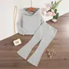 Conjunto Infantil Outono Novo Casual Cor Sólida Malha Canelada Simples Moda Blusa com Capuz de Manga Longa e Calça Flare