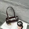 Bolsa Feminina de Couro Genuíno Estilo Coreano Bolsa Cilíndrica Nicho Moderna Couro de Vaca Camada Superior Padrão Craquelê Bolsa de Ombro Bolsa Simples de Axila
