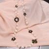 Moda coreana estilo pequeño collar largo gota negra esmalte Camelia cristal marca grande cadena colgante cadena decorativa para suéter venta al por mayor