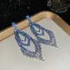 Pendientes de Plata Europeos y Americanos Transfronterizos con Borlas en Forma de Abanico Incrustadas de Diamantes, Pendientes de Nicho Exagerados de Lujo Ligero, Accesorios de Oreja de Personalidad Versátiles de Moda