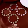 Pulsera con Cierre de Flor de Cuatro Pétalos de Circonita Vintage Moda para el Trabajo Simple Versátil Pulsera Lujo Ligero Nicho Tendencia Nacional Joyería para Mujeres
