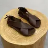 Sandalias tejidas hechas a mano de comercio exterior de verano 2026, sandalias retro artísticas de puntera abierta de cuero suave y plano para mujer para comercio transfronterizo