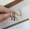 Pendientes de Zirconia Plateados Geométricos de Gota de Agua para Mujer 2025 Nuevos Pendientes de Diseño de Nicho Pendientes de Doble Perforación de Alta Gama