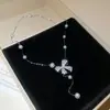 Collar de Perlas con Lazo de Circonita Estilo Suave Luna Blanca Cadena para Clavícula Dulce Francesa Cadena para Suéter de Lujo Ligero Sensación de Alta Gama