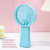 Mini ventilador de mão ventilador de mesa pequeno cor de doce vertical três ventos recarregável por USB ventilador elétrico portátil atacado