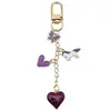 Llavero de corazón de hongo rojo y corazón de rosa transfronterizo para bolso de mujer colgante mejor amiga pequeño regalo