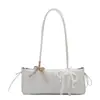Este ano, o estilo doce e feminino está em alta, com bolsas quadradas pequenas e bolsas de ombro sendo populares.. Aqui estão alguns novos designs de primavera de 2026: bolsas de ombro leves e minimalistas e bolsas de antebraço da moda