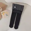 Leggings de invierno para niños de alta elasticidad, nuevo para otoño, con rayas verticales, protección catiónica en la cintura, ropa exterior elegante, con pies, venta al por mayor de fábrica