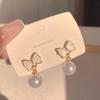 Versión coreana de pendientes largos de perlas con borlas, pendientes de temperamento de alto sentido del lujo, pendientes de personalidad para mujer, puesto al por mayor.