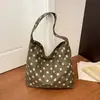 Bolso de Lona Casual de Gran Capacidad para Mujer 2026 Otoño Temprano Nuevo Ligero para Viajes Diarios Bolso de Hombro Único Bolso Tote Cubo de Lunares