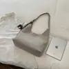 Bolsa tote de moda retrô personalizada para mulheres, versão coreana, adequada para trabalho e deslocamento, bolsa de ombro, nova bolsa de ombro versátil de outono 2026