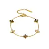 Pulseira de aço titânio com trevo de quatro folhas e strass para mulheres, best-seller transfronteiriço europeu e americano, joia requintada de luxo leve, pulseira versátil estilo europeu e americano