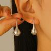Pendientes de acero inoxidable con tres gotas de agua y oro de 18 quilates con explosiones sencillas transfronterizas, pendientes de acero inoxidable con forma de lágrima dorada para mujer