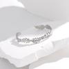 Pulsera europea y americana transfronteriza de acero de titanio con apertura de hoja, pulsera creativa de acero inoxidable con presión de aceite para mujer, joyería al por mayor chapada en oro para comercio exterior