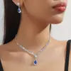 Conjunto de dos piezas de collar y pendientes con cadena de garra exquisita de gran venta transfronteriza, collar con gota de agua, cadena para clavícula, accesorios para cenas para mujer