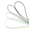 Punto de fábrica Cadena para gafas de joyería transfronteriza europea y americana Cadena de gafas de perlas blancas y negras Cadena colgante Cadena para mascarilla