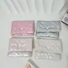 Nuevo Billetero Rosa de PU de Alta Calidad Bolsa Protectora para Identificación de Estudiante Bolsa de Cosméticos Bolsa Portátil para Niña Bolsa para Toallas Sanitarias Moderna