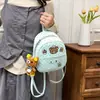 Mochila de grande capacidade, estilo coreano, fofa, com bordado de urso de bolinhas, nova moda verão 2026, simples, versátil, leve