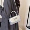 2025 Nuevo Lazo Nicho Gama Alta Estilo Occidental Simple Alto Valor Facial Bolso de Hombro Cruzado Pequeño Cuadrado Elegante para Mujer