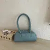 Bolso de hombro cruzado 2026 de alta costura, versátil para el día a día, moderno, bolso baguette casual de nicho para el trabajo