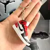Mismo Nuevo Llavero Estándar de Primera Generación de Douyin Modelo de Zapato aj Llavero aj Estéreo 3D ABS