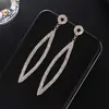 Versión coreana de pendientes de pedrería de diamante completo personalidad pendientes ovalados moda pendientes simples fabricantes stock E681