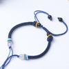 Pulsera trenzada DIY cuerda roja cuentas negras moda simple multicolor opcional ajustable cuerda de mano fabricantes mayoreo