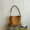 Bolsa de um ombro com textura tramada feminina 2026 nova bolsa de mão retrô versátil bolsa tote bolsa transversal de grande capacidade bolsa feminina da moda