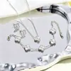 Pulsera de trébol de cuatro hojas de acero de titanio transfronteriza, juego de trébol de cuatro hojas, collar, anillo, pendientes, juego de joyería de acero de titanio con láser al por mayor