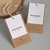 Nuevas Etiquetas de Ropa Personalizadas Estilo Clásico Simple Retro Etiquetas de Producto de Marca de Ropa Papel Kraft de Alta Gama Etiquetas Colgantes Personalizadas
