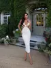 En stock Vestido de Verano Nuevo Estilo Calado sin Mangas con Tirantes, Venta Caliente Transfronteriza Europea y Americana Vestido Sexy con Abertura Alta