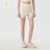 Suministrado directamente por el fabricante, falda de yoga de cintura alta para mujer, falda-pantalón anti-exposición de dos piezas simuladas, elástica, que se ajusta a las caderas, adelgazante, media falda deportiva