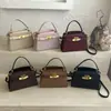 Bolsa Kelly chic vintage versátil elegante e estilosa, bolsa de mão pequena quadrada para mulheres, bolsa de ombro e transversal