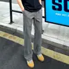 Calça comprida masculina da moda, estilo japonês, com perna inclinada e levemente alargada, perfeita para outono e inverno, com uma estética high-street americana que faz você parecer mais alto e magro, uma calça longa fashion e casual