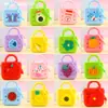 Monederos de silicona al por mayor, billeteras pequeñas, estuches para auriculares, llaveros para niñas, bolsos pequeños de mano y accesorios para mochilas en colores macaron