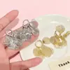 Aretes de Borla Hueca con Forma de Pétalo Diseño de Nicho Único Nuevos 2025 Pendientes de Lujo Accesible para Mujer