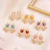 Pendientes transfronterizos de moda: Aretes de tulipán con una estética vintage y fresca, con delicados diseños de flor de tulipán, material de cobre y circonita cúbica microincrustada