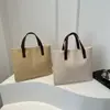 Bolso Tejido Portátil Estilo Coreano Nueva Moda Primavera y Verano 2025 Bolso Tote Cubo Simple Gran Capacidad Bolso de Mano para Viajes
