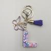 Floco de neve roxo lantejoulas gotas de cola letras em inglês chaveiro bolsa para meninas pingente borboleta borla joias produtos acabados