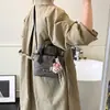 Bolsos Pequeños Populares de Este Año para Mujer Verano 2025 Nuevo Bolso de Hombro Cruzado Bolso de Mensajero Retro de Gama Alta Bolso Cubo