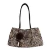 2026 Nova Bolsa Tote Estampa de Leopardo Feminina Versátil Estilo Retro de Nicho Bolsa de Ombro Grande Capacidade para o Dia a Dia Bolsa de Mão com Alça Única