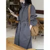 Actualización de talla de envío Otoño e invierno chic coreano Estilo coreano Cuello alto Botones Versátil Holgado Longitud media Gabardina Chaqueta