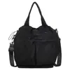 Nova bolsa de tecido de comércio exterior, bolsa de mão versátil de cor sólida simples estilo japonês, bolsa de ombro e transversal casual de grande capacidade para o dia a dia, moderna